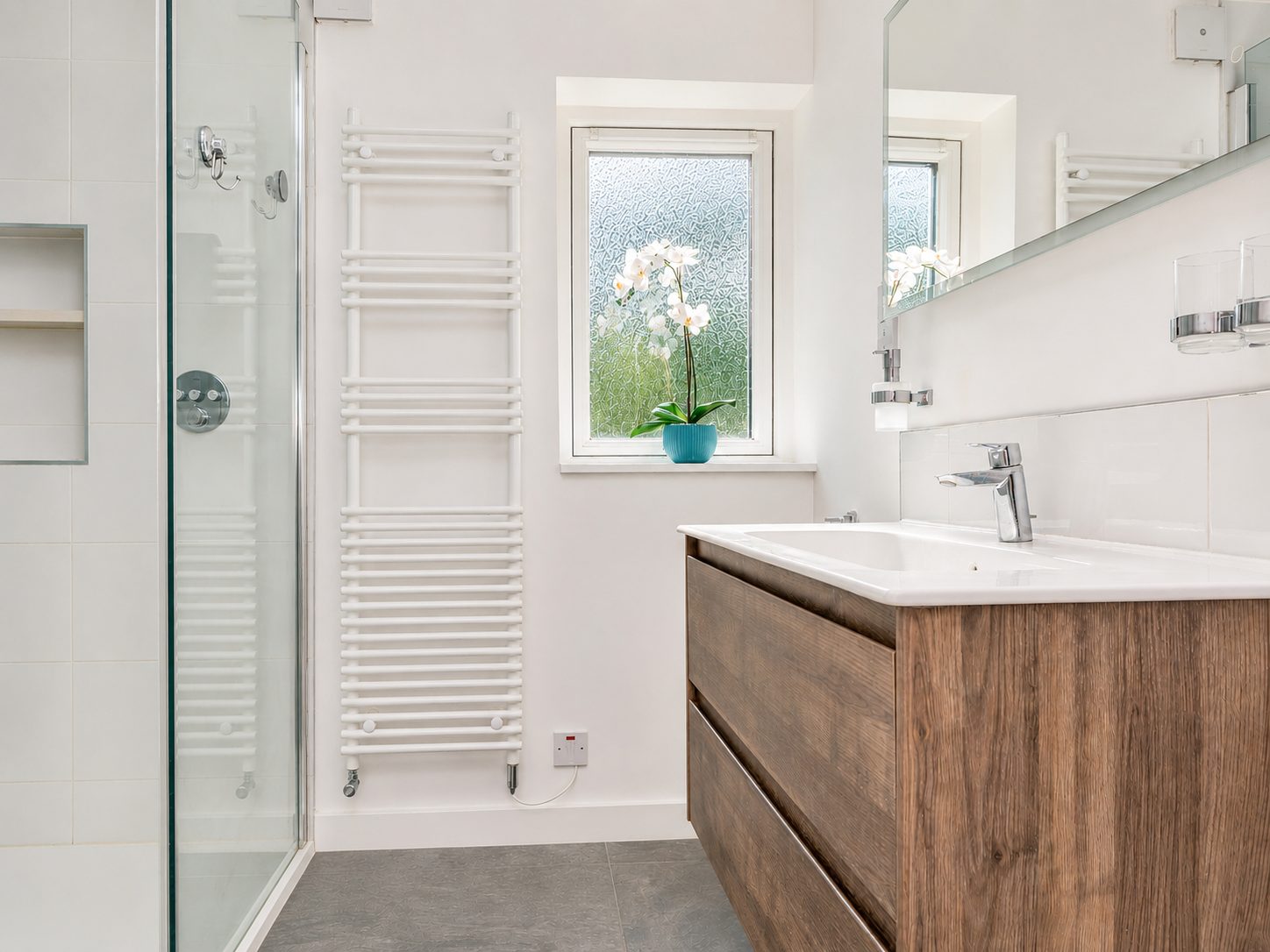 Bathroom with walk-in shower and timber vanity