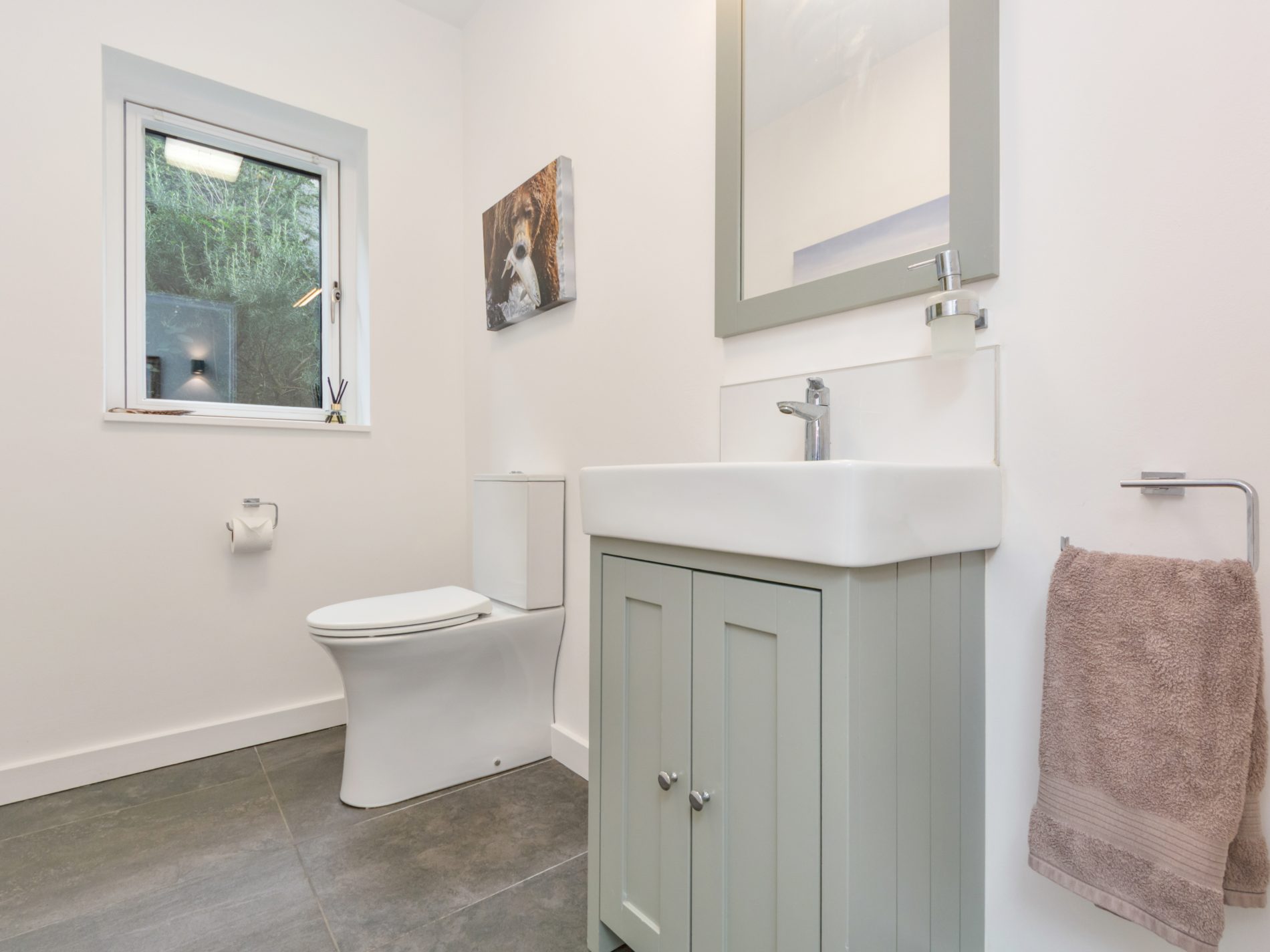 Bathroom with vanity and natural light